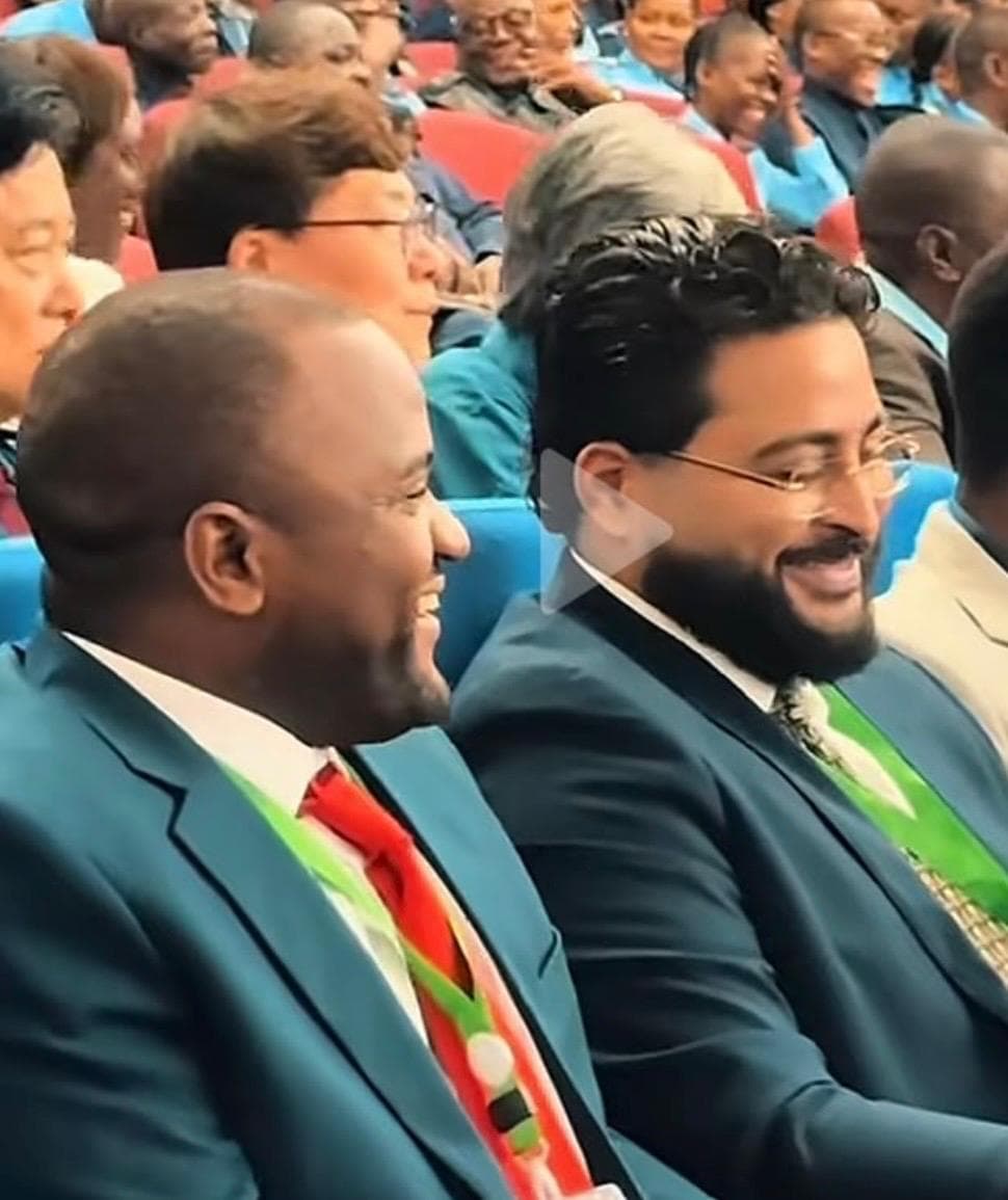 Delegates seated in the forum auditorium